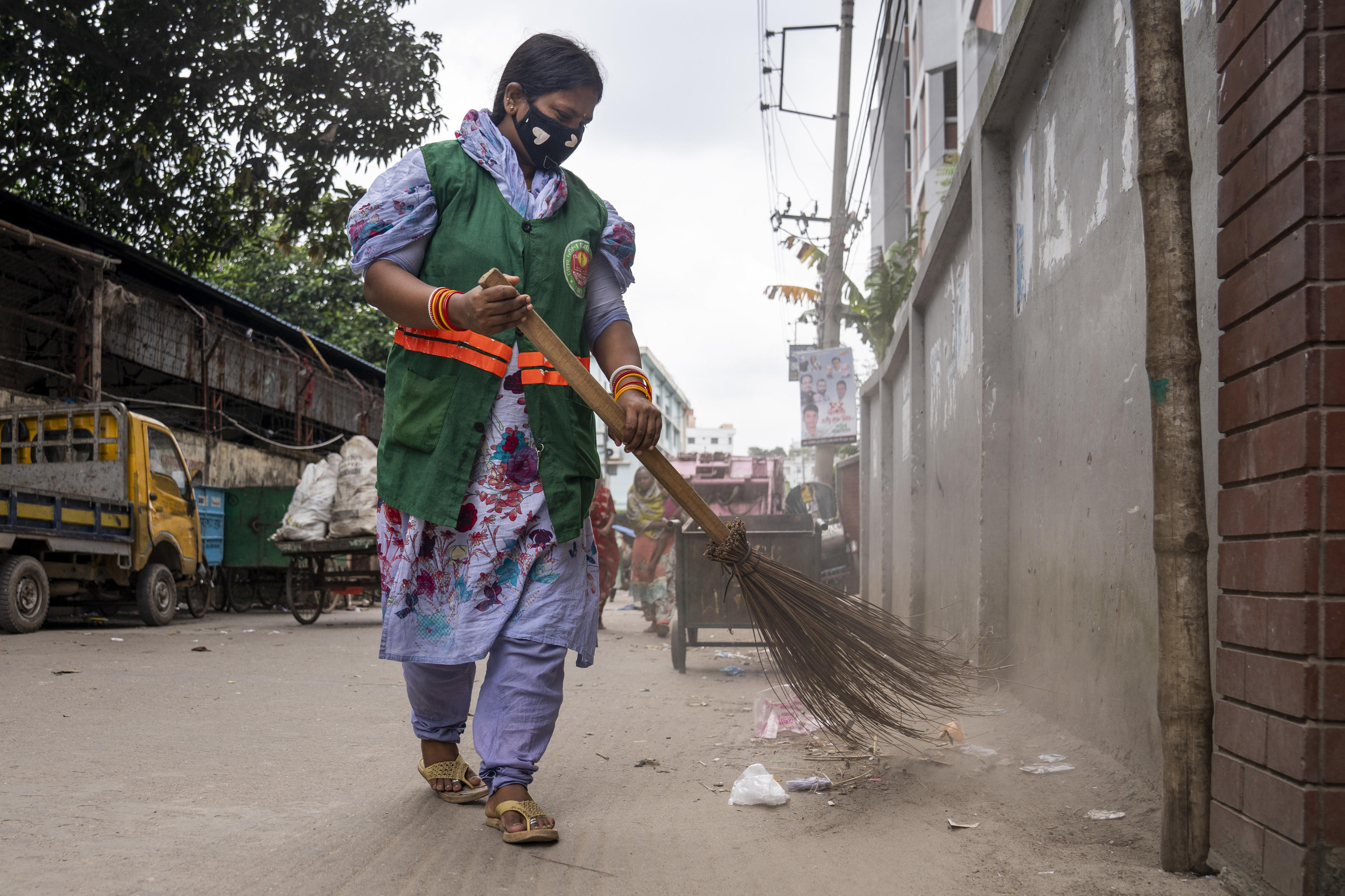 Workers handling waste